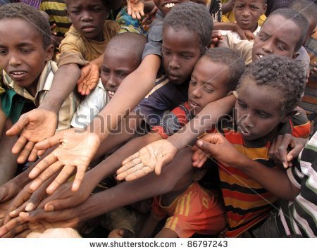 stock-photo-dadaab-somalia-august-unidentified-children-stretch-out-their-hands-at-the-dadaab-re.jpg