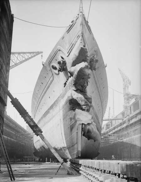 HMS King George V in the Gladstone Dock at Liverpool, May 17, 1942 following a collision with ...jpg
